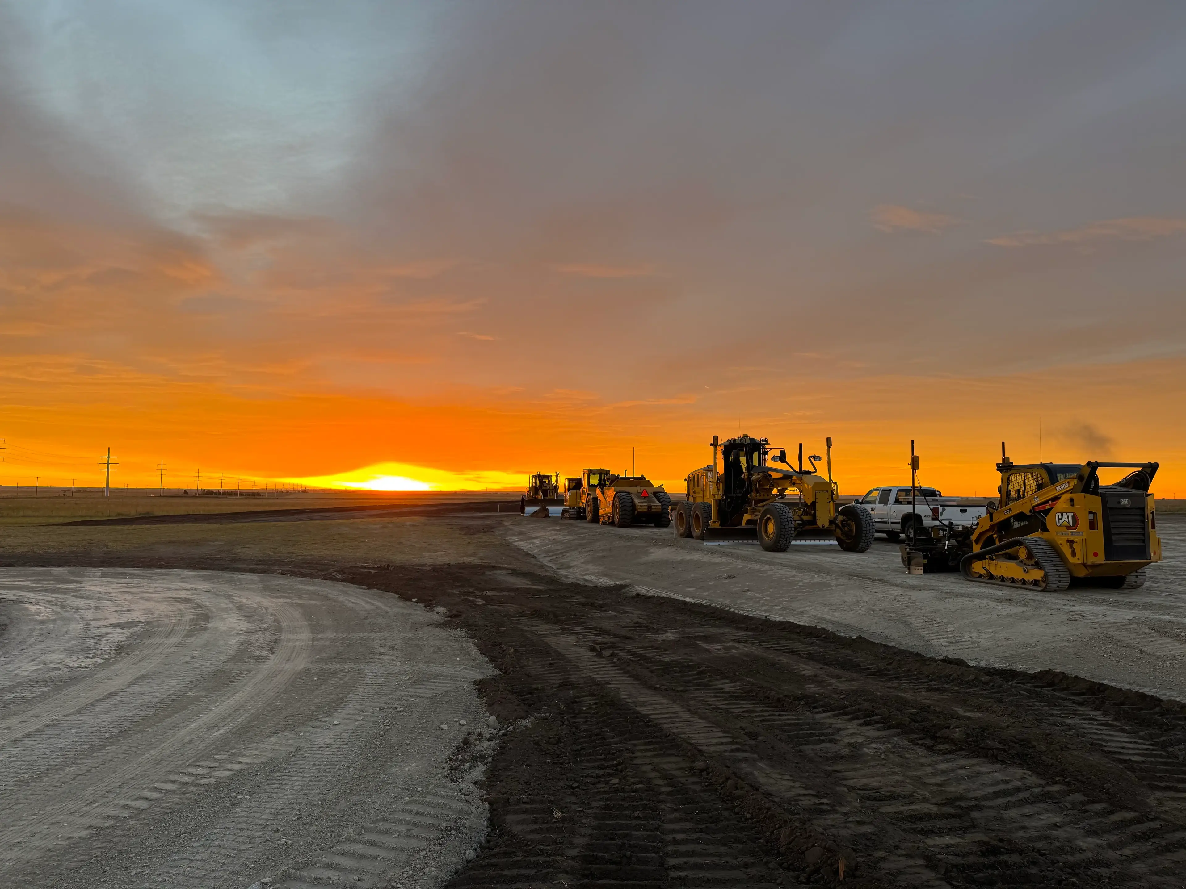 Riding arena construction with proper drainage and base preparation - Bear Excavating building equestrian arena in Southern Alberta